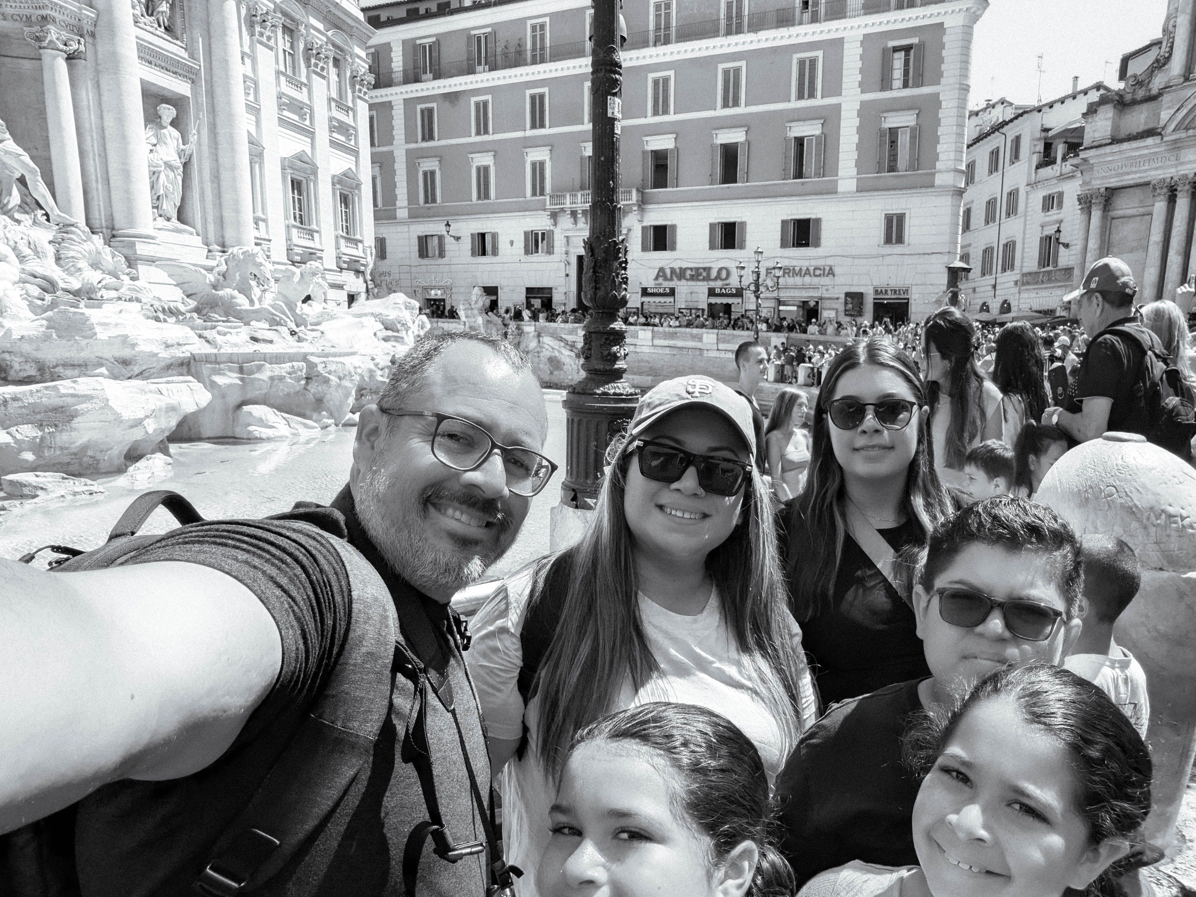 My pack and I in Rome, Italia visiting the Trevi Fountain Image alt